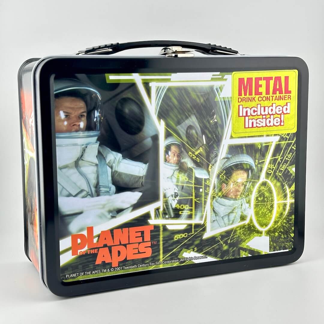 Metal lunchbox with black border and plastic handle with image of Mark Wahlberg from Planet of the Apes. 