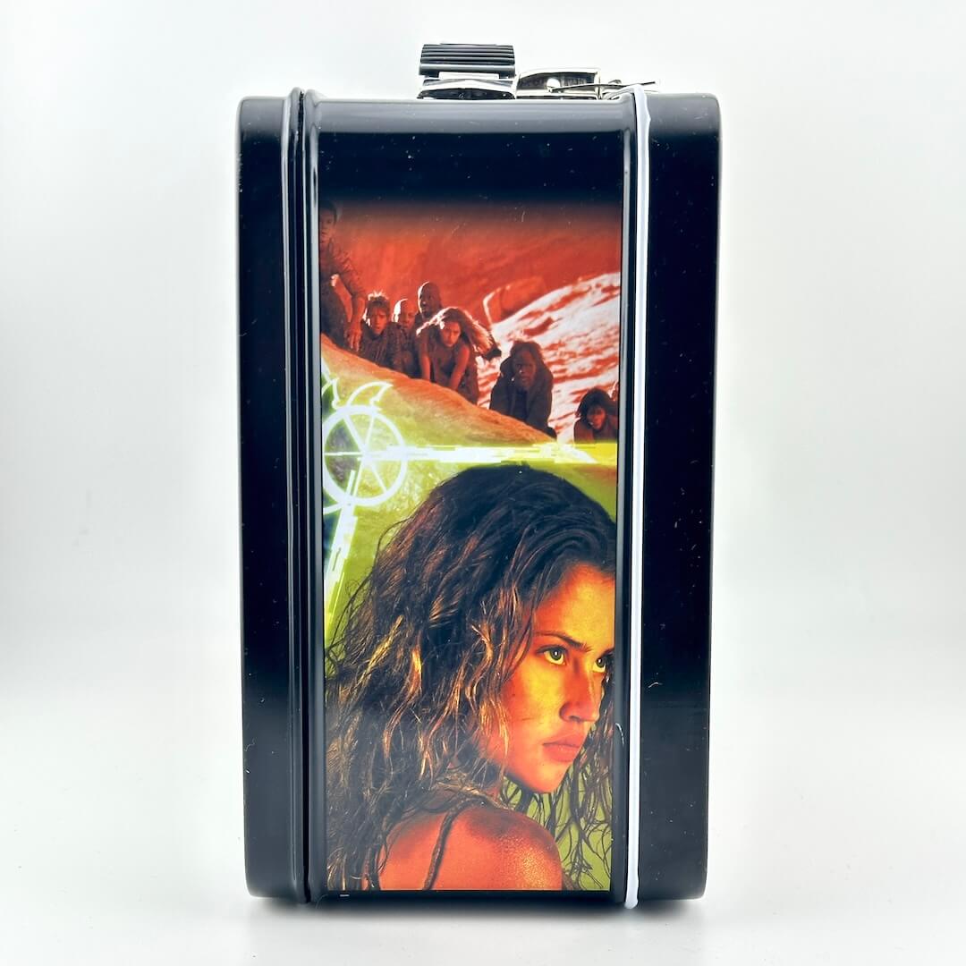 Side view of metal lunchbox with images from new Planet of the Apes movie surrounded by black border. 