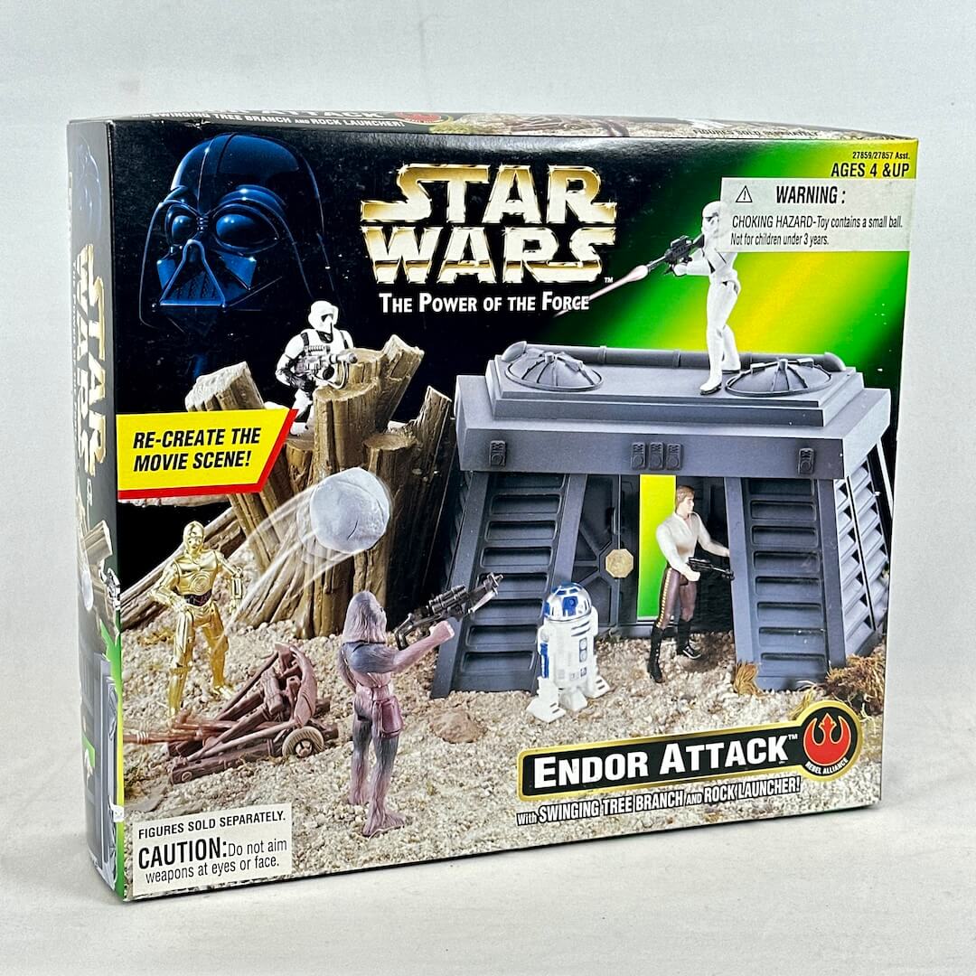 Star Wars toy set packaging with figures and landscape on a gray background