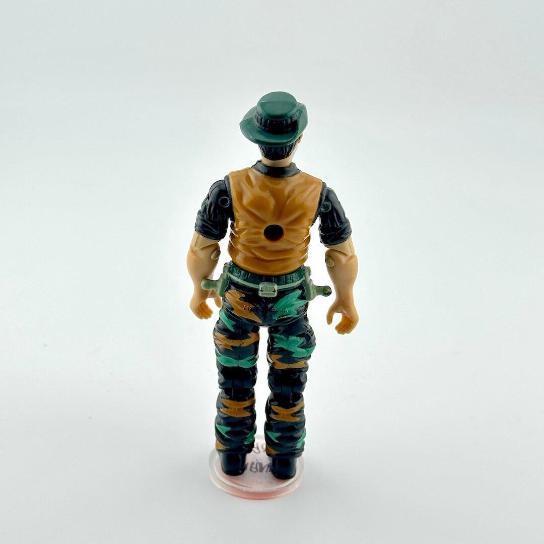 G.I. Joe action figure in military attire against white background. 