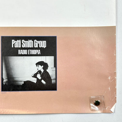 Bottom right corner with crease at corner and edge wear.