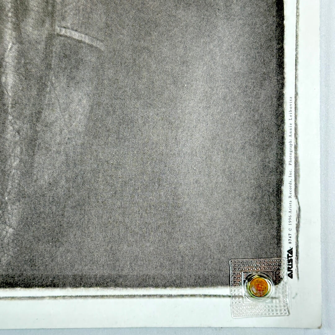 Bottom right corner in good condition, showing copyright information. 