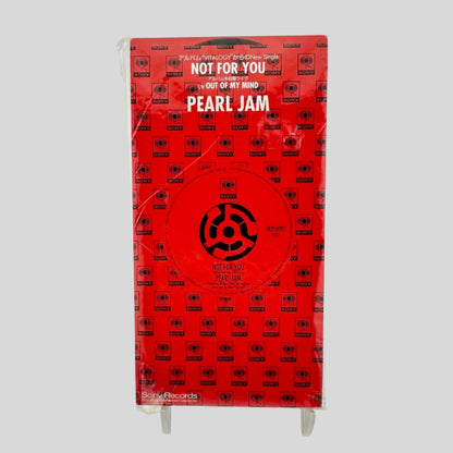 Red packaging with black text & symbols. White text for main title & artist information in Japanese & English.