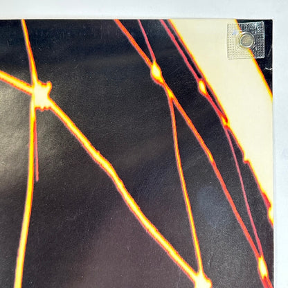 Top right corner with micro tear just below corner on right side. 