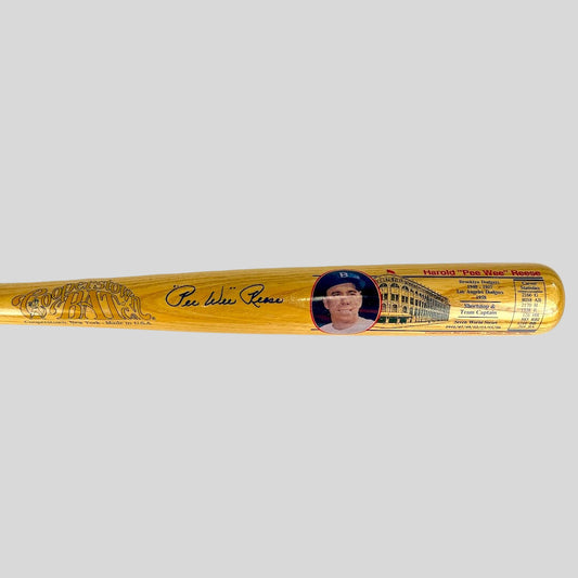 Baseball bat with a player's portrait and signature on a white background