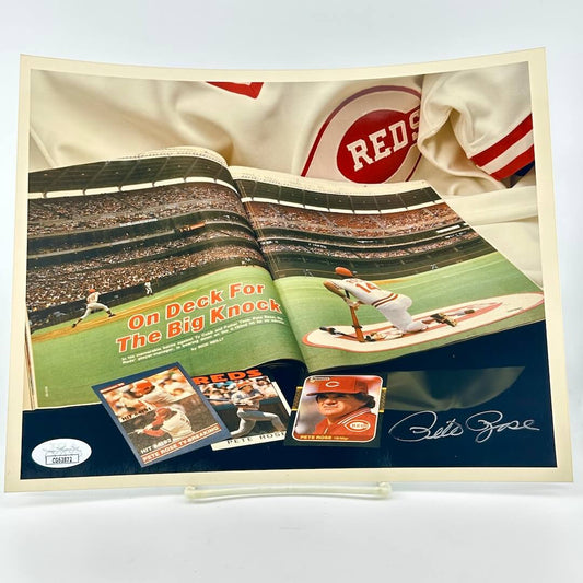 Photograph of memorabilia collage featuring signature of player, JSA authentication sticker in corner. 