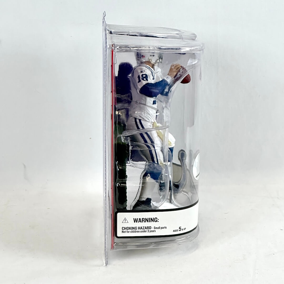 Football player action figure in packaging on a white background