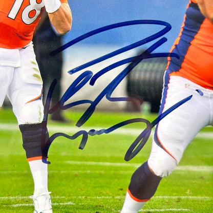 Close-up of signature on the central photo. 
