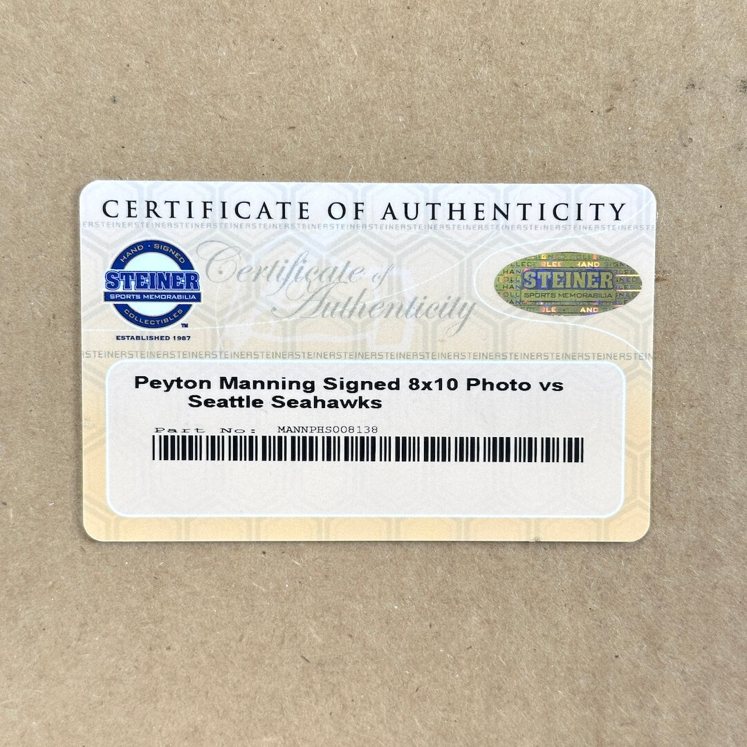 Close-up of certificate of authenticity on backside of frame with barcode. 