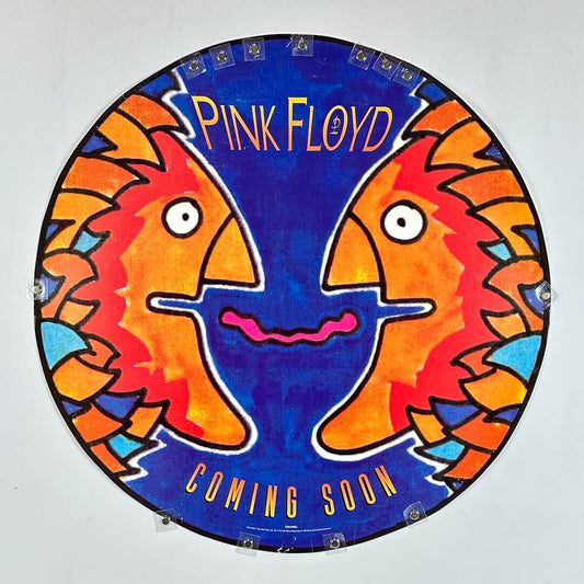 Circular artwork with colorful faces and 'Pink Floyd Coming Soon' text on a blue background