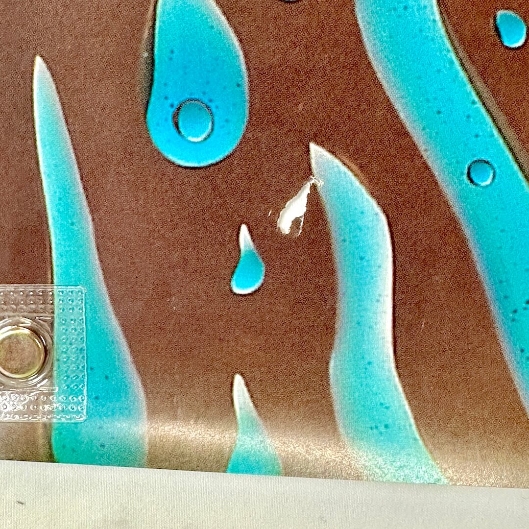 Close up of small tear.