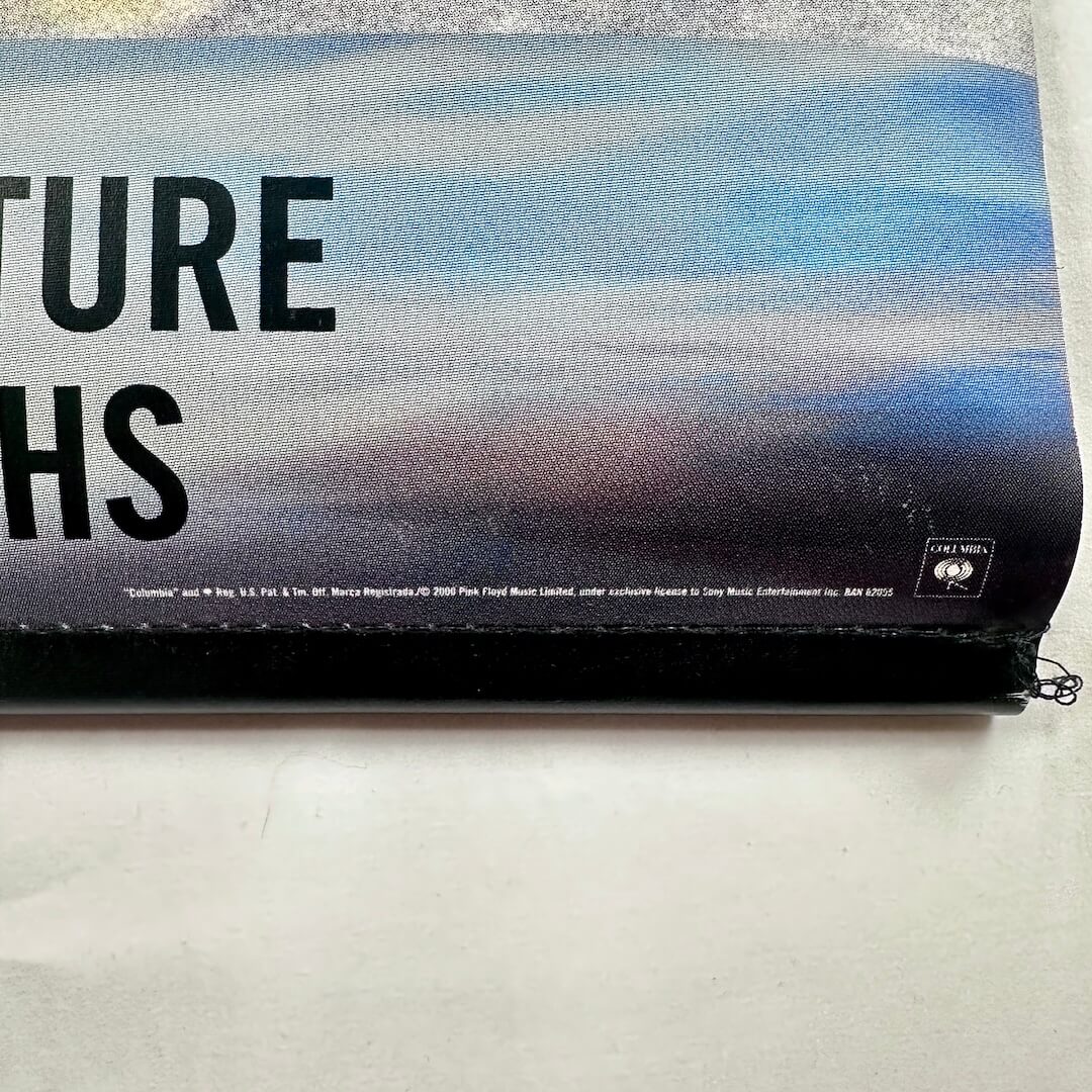 Bottom right corner of banner with copyright and licensing information.