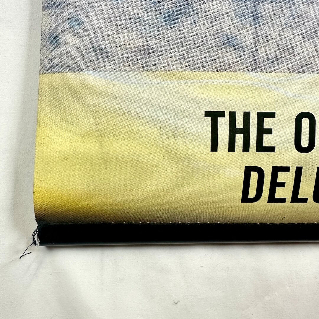 Bottom left corner of banner