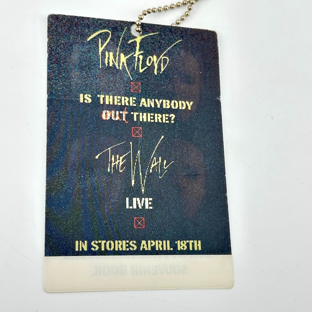 Promotional laminate for Pink Floyd album 'Is There Anybody Out There?' with text and album cover image.