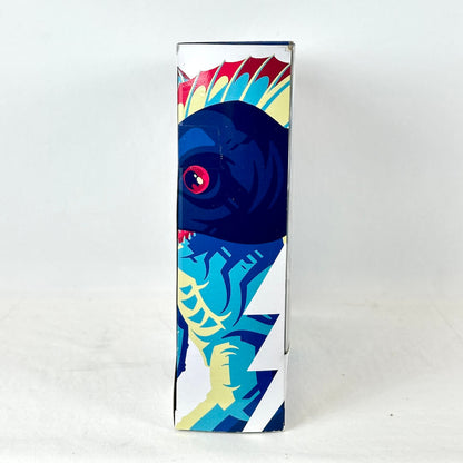 Side view of packaging with illustration of character in bright colors. 