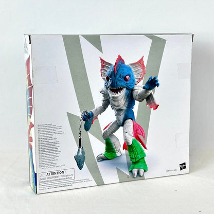 Back view of packaging with illustration of assembled toy with warning label. 