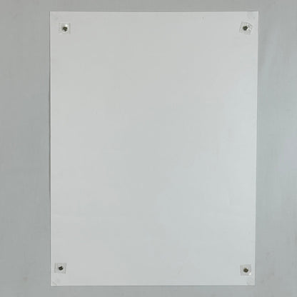 Backside of poster against white background. 