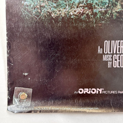 Bottom left corner with publishing information, pin holes, and edge wear.