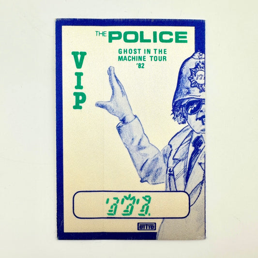 Vintage white backstage pass with blue border and illustration of policeman and event details in green text. 