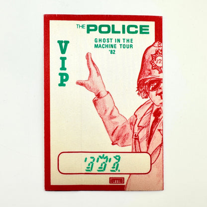 Vintage white backstage pass with red border and illustration of policeman and event details in green text. 
