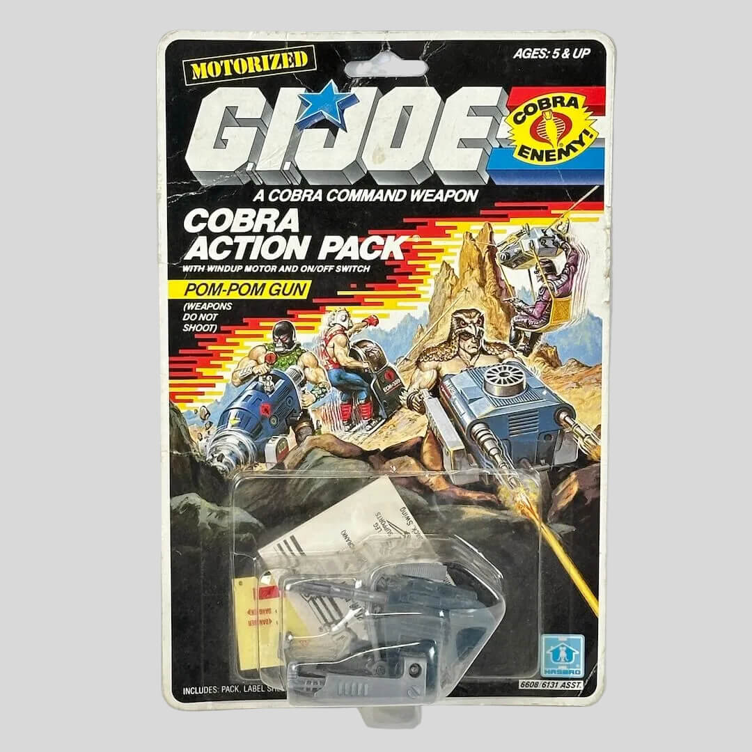 Vintage G.I. Joe Cobra Action Pack toy in packaging on a light gray background