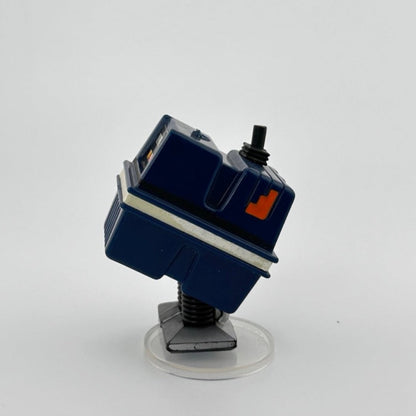 Image of blue box-shaped droid with white stripe around middle, little black antennae, & black flat feet. 