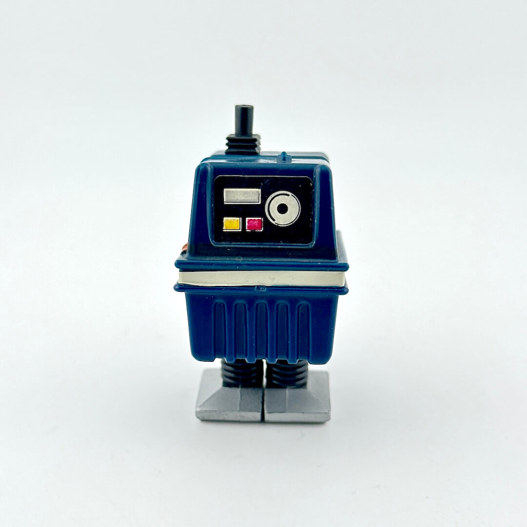 Small blue robot toy on a white background