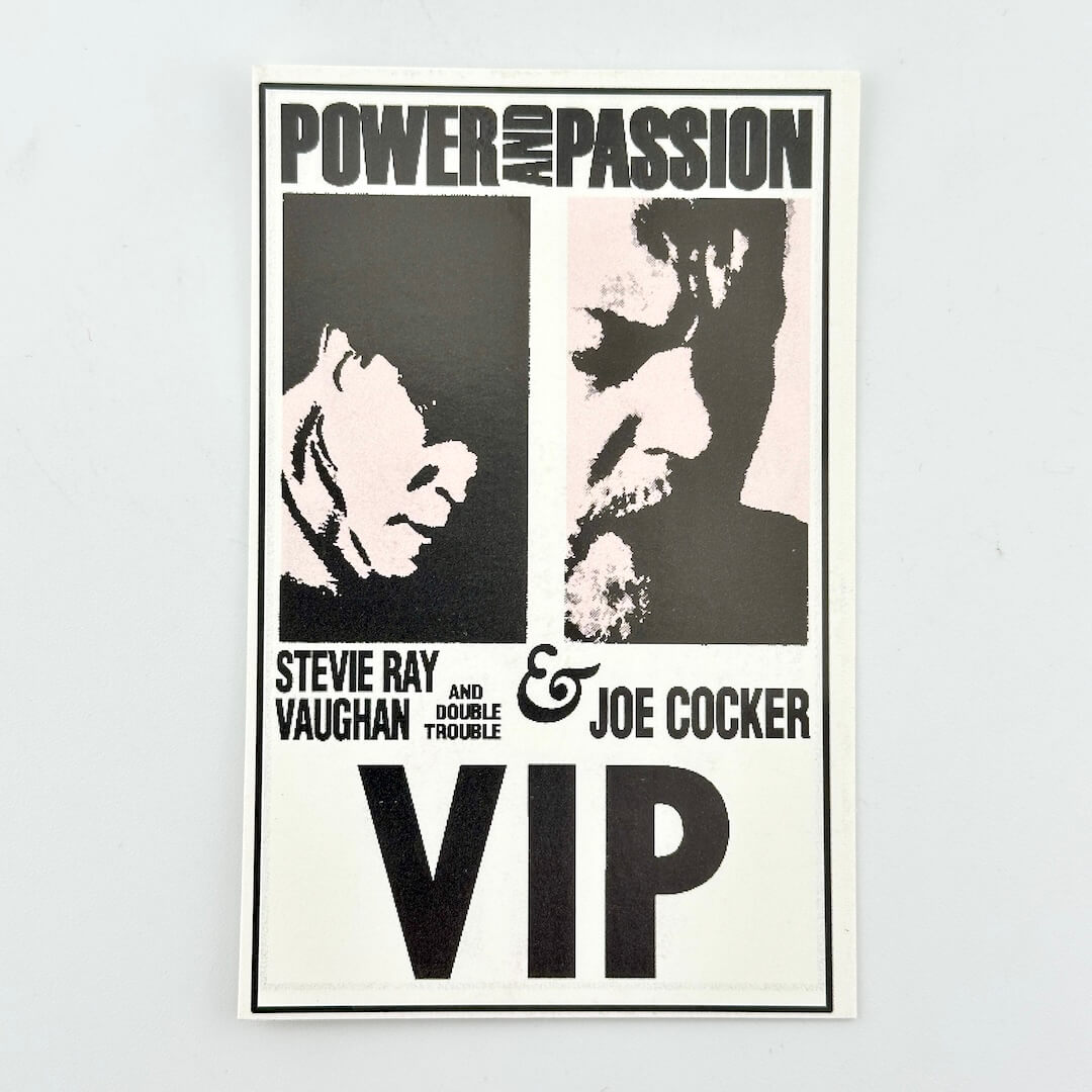Ticket featuring Stevie Ray Vaughan and Joe Cocker with text 'Power and Passion' on a light gray background.