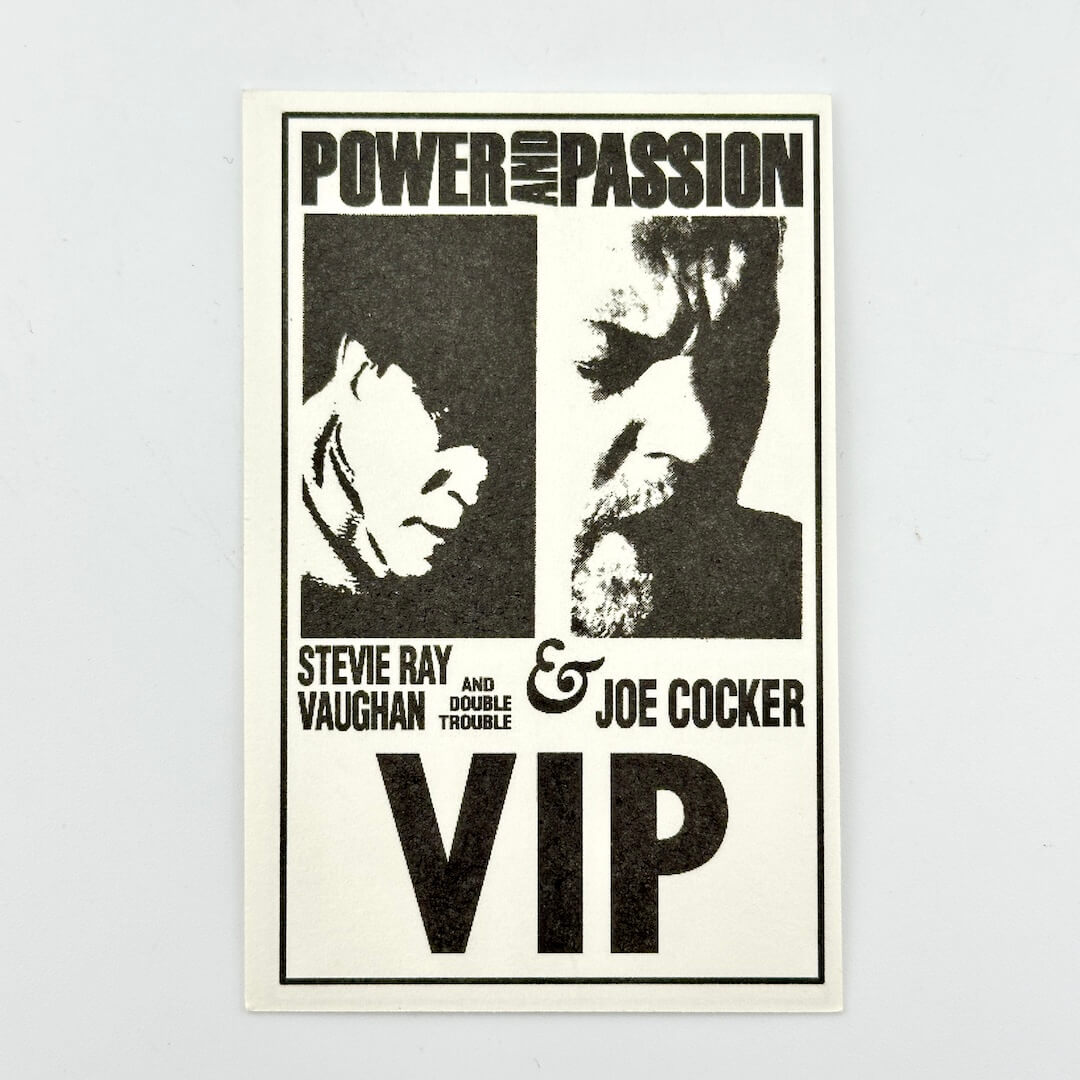 Ticket featuring Stevie Ray Vaughan and Joe Cocker with text 'Power and Passion' on a light gray background.