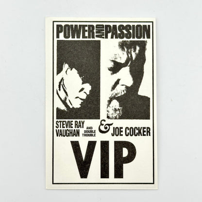 Ticket featuring Stevie Ray Vaughan and Joe Cocker with text 'Power and Passion' on a light gray background.