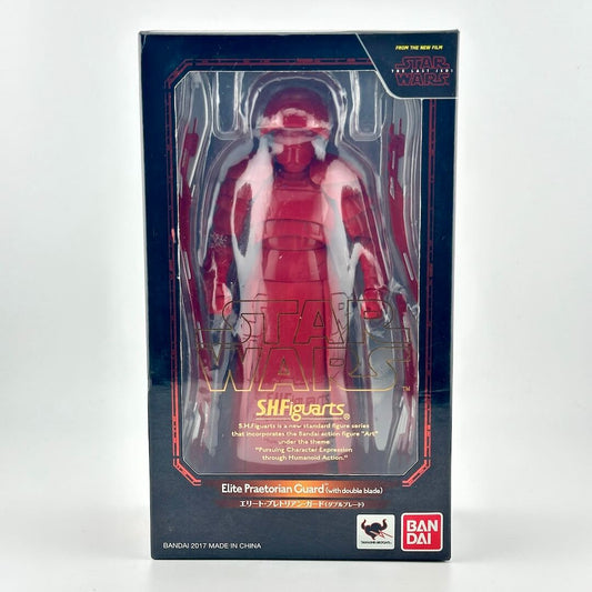 Star Wars action figure in black retail box with window showing figure in all red with accessories. 
