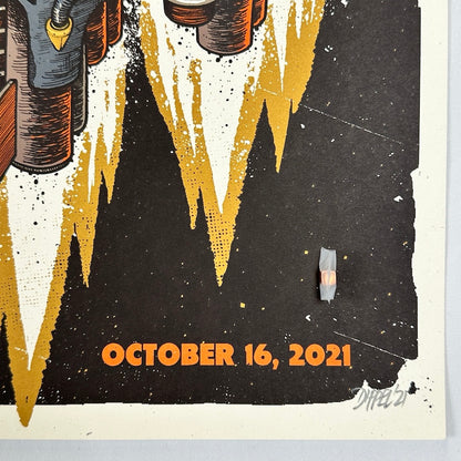 Close up of artist signature in bottom right corner. Visible are the event date printed in orange on black, jet graphics.