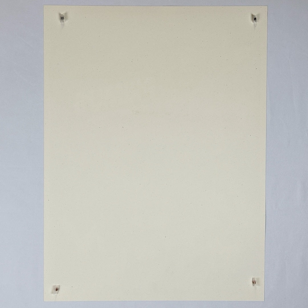 Backside of cream colored poster with no damage or smears visible.