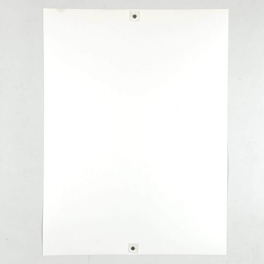 Backside of poster to show stain placement and lack of other damage. 