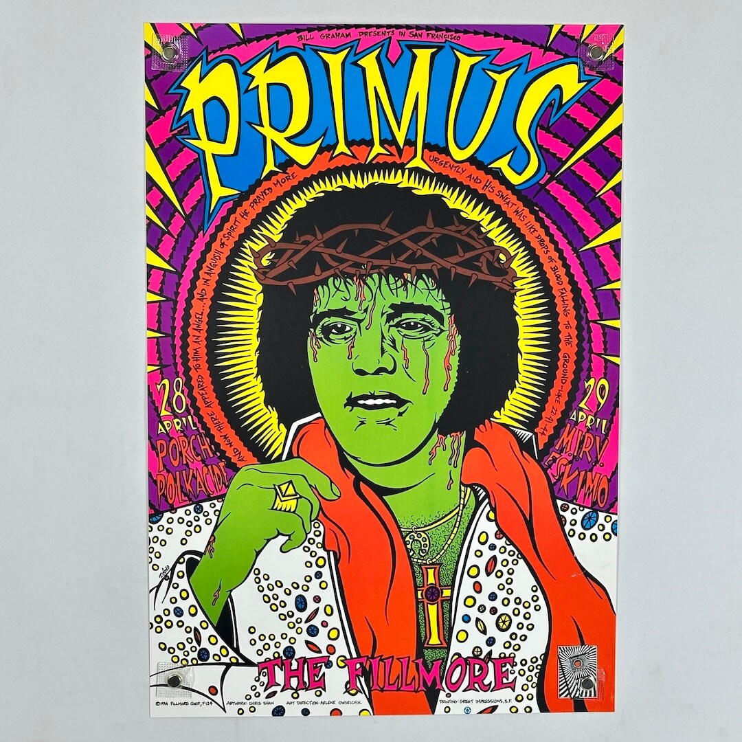 Colorful Primus poster with a stylized portrait and vibrant design elements.