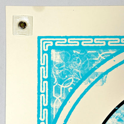 Top left corner with stain about an inch from the corner on edge. 