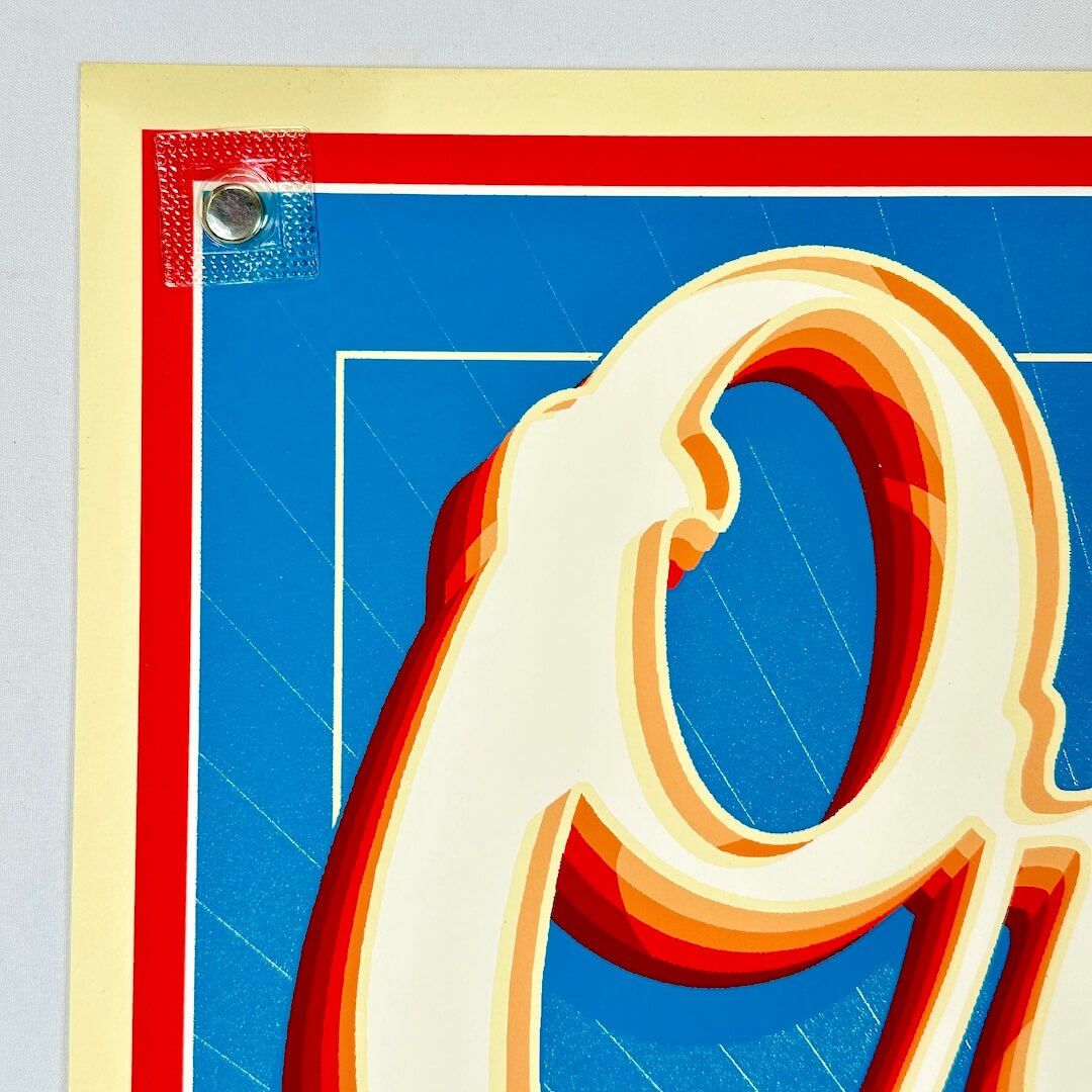 Top left corner with grease stain about an inch into edge. 