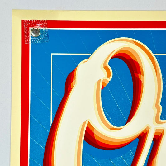 Top left corner with grease stain about an inch into edge. 