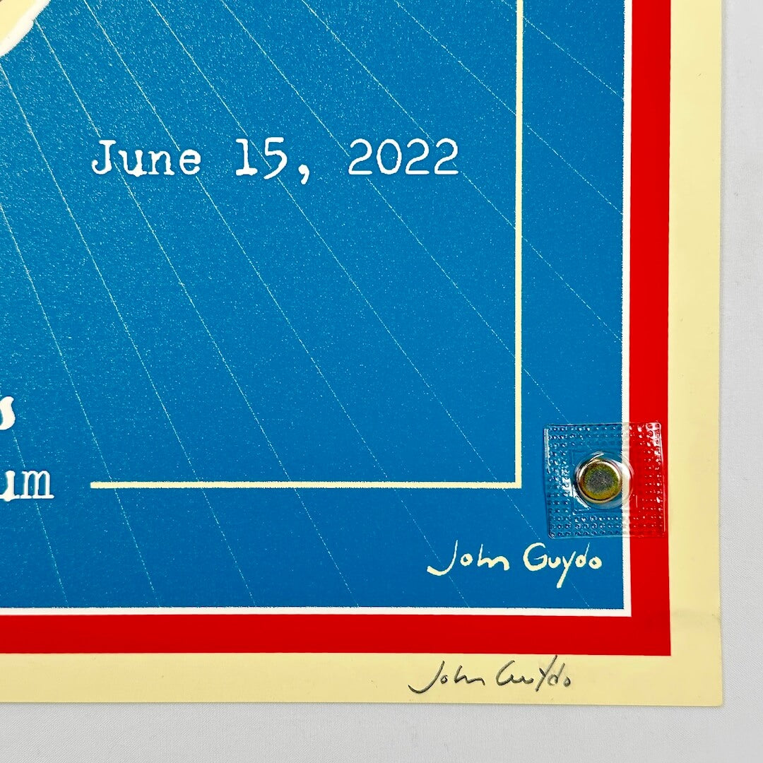 Bottom right corner of poster with artist signature in pencil in border. 