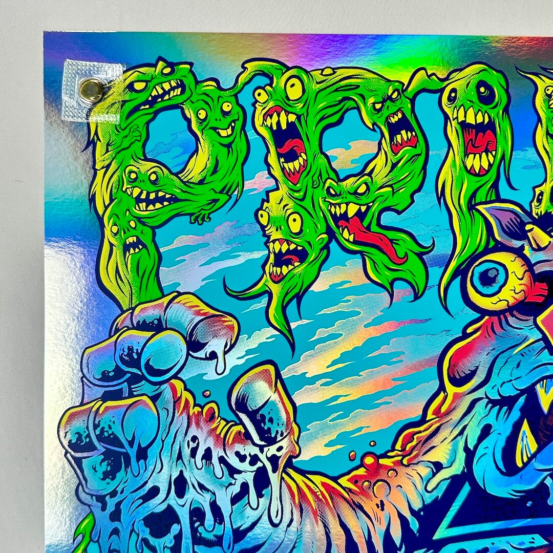Top left corner of poster showing crisp corner and edge, "PRIMUS" written in green ghosts. 