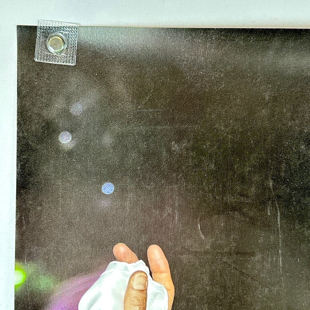 Top left corner of poster with good edges and some scratches