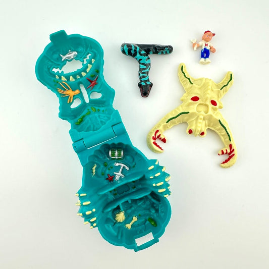 Collection of colorful toy figures on a white background. 