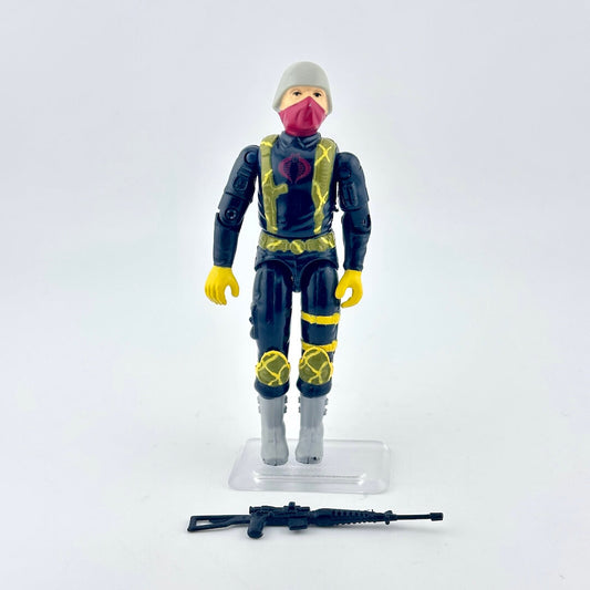 Toy figure in a futuristic outfit with a helmet and mask on a white background