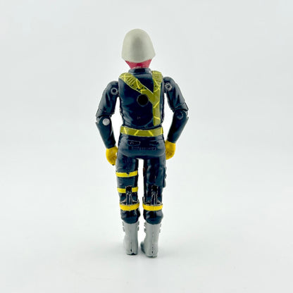 A toy action figure shown from the back, wearing a black and yellow futuristic suit with a gray helmet and gray boots.