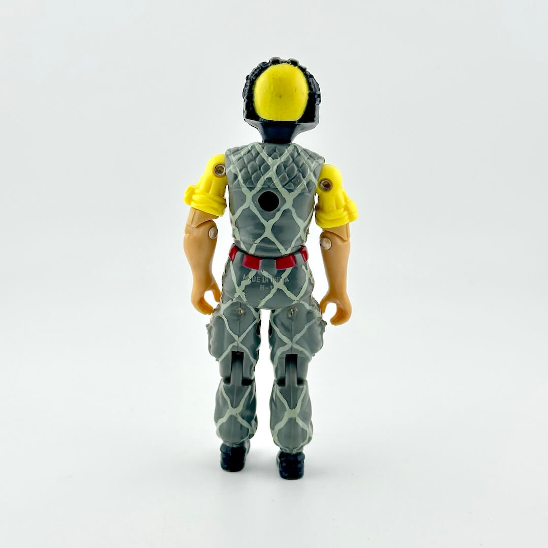 Backside of action figure showing near mint condition and COO on bum. 