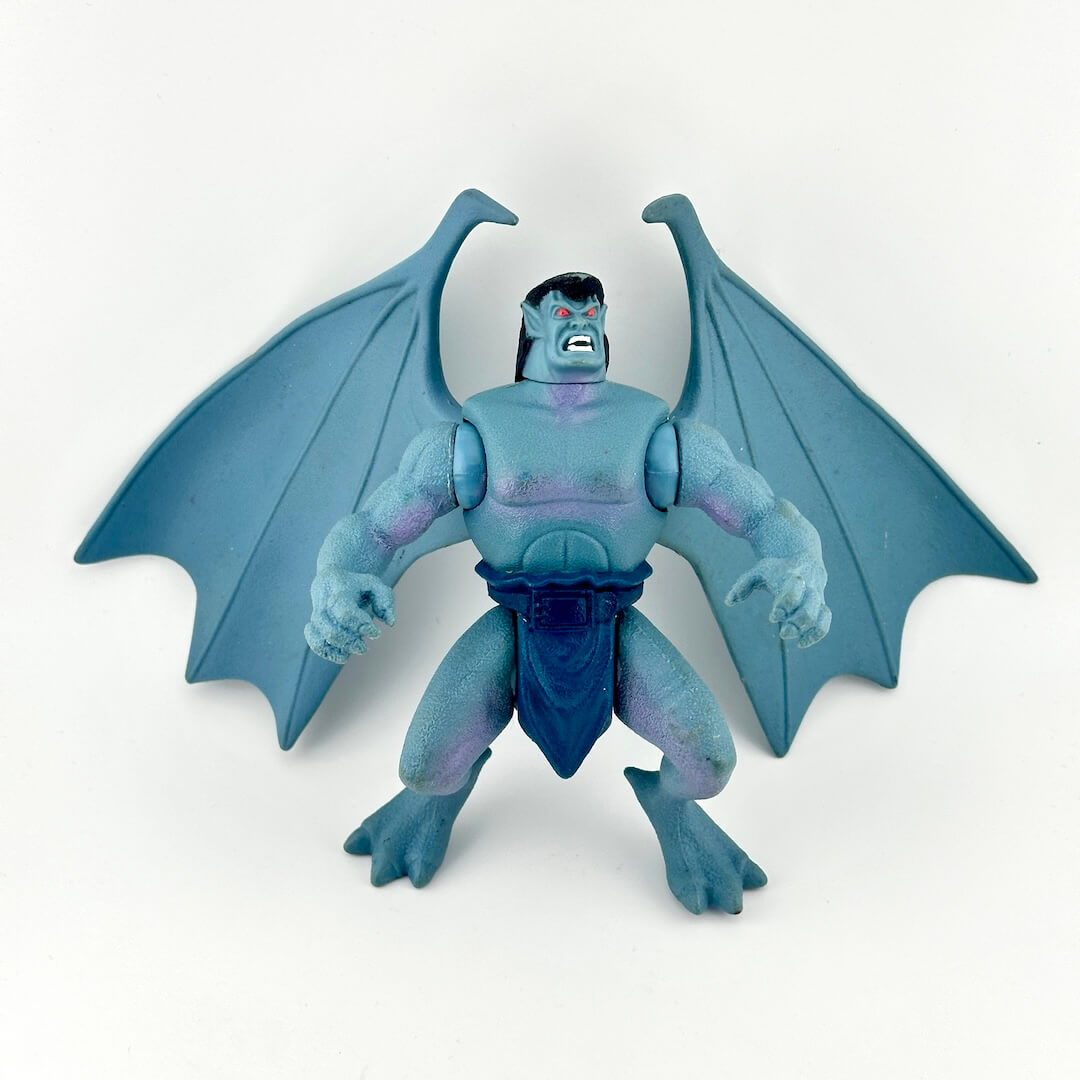 Blue winged gargoyle action figure from Disney show on white background. 