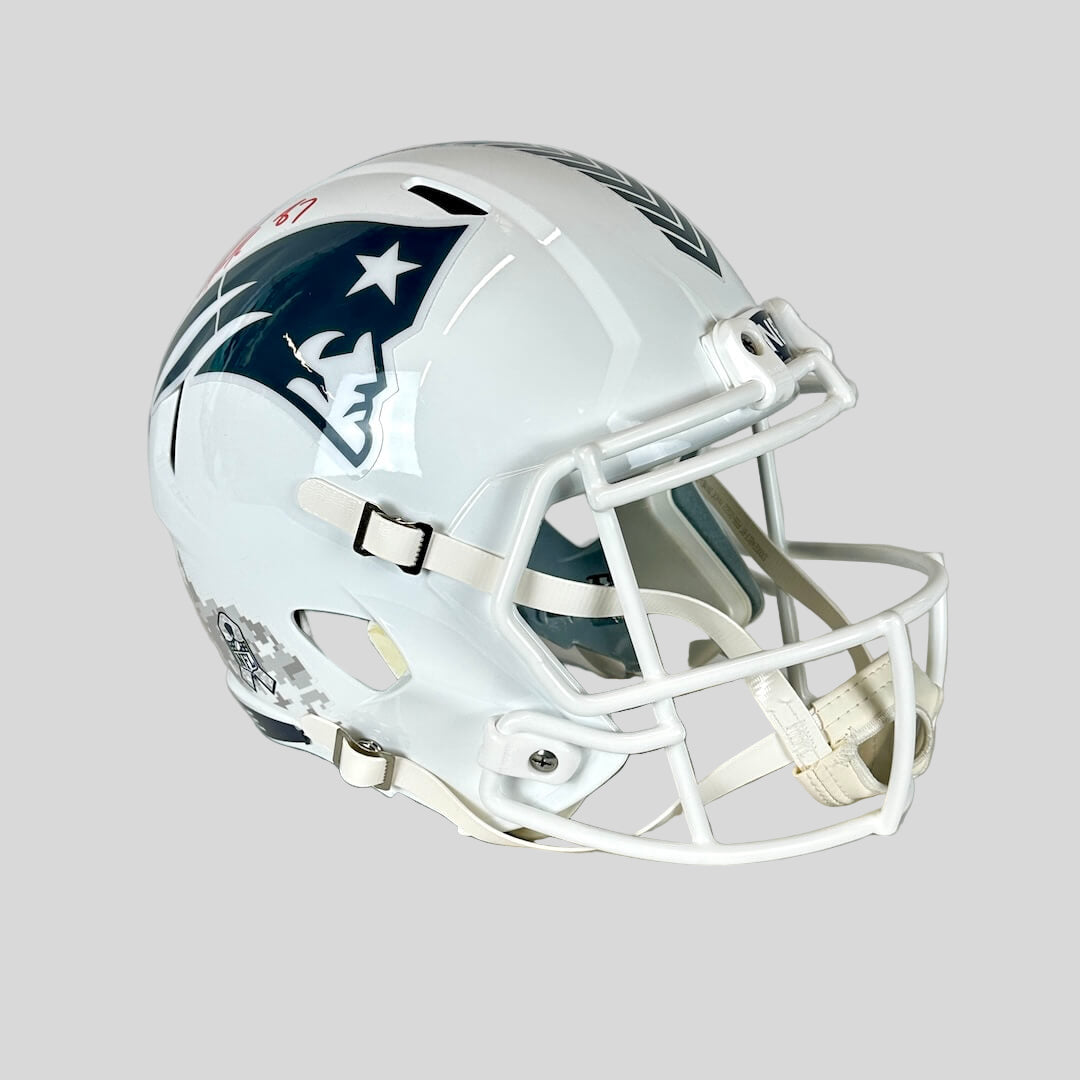 Signed white football helmet with Patriots logo