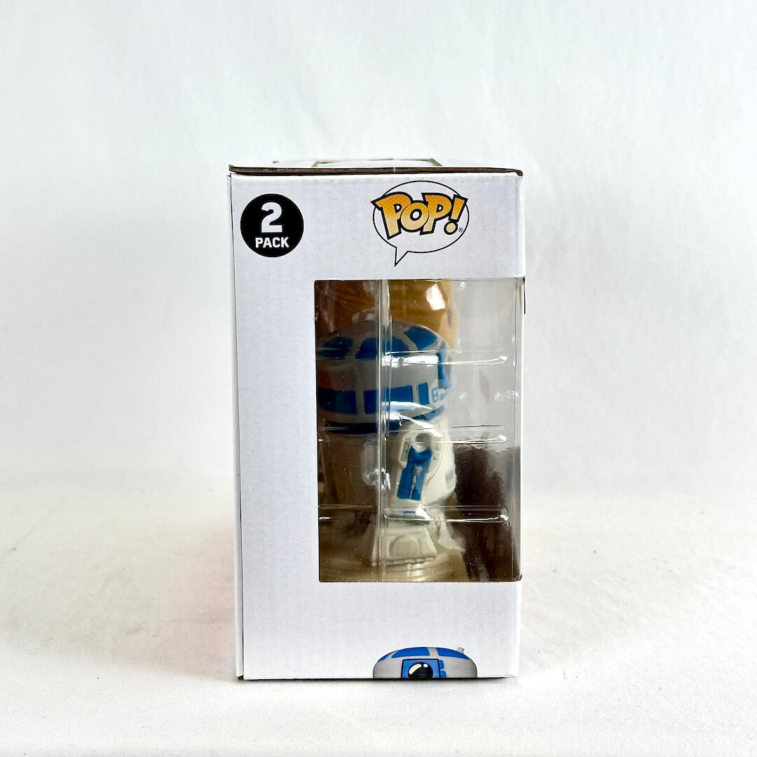 Funko Pop! 2-pack box containing two Star Wars R2-D2 figures, shown in its original white window box packaging.