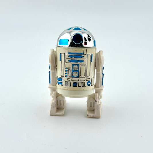 Toy robot resembling R2-D2 from Star Wars on a white background