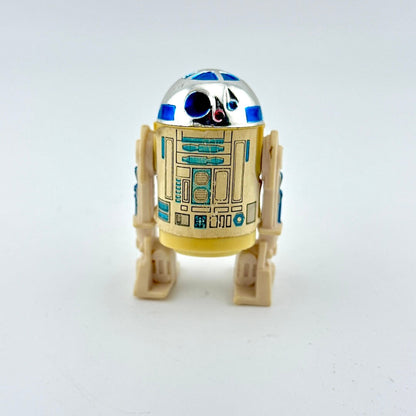 Toy robot resembling R2-D2 from Star Wars on a white background
